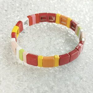 BRAND NEW Roxanne Assoulin Rainbow Brite Enamel Stretch Bracelet Gold